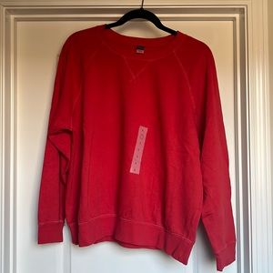Brand new red sweatshirt. Never been worn